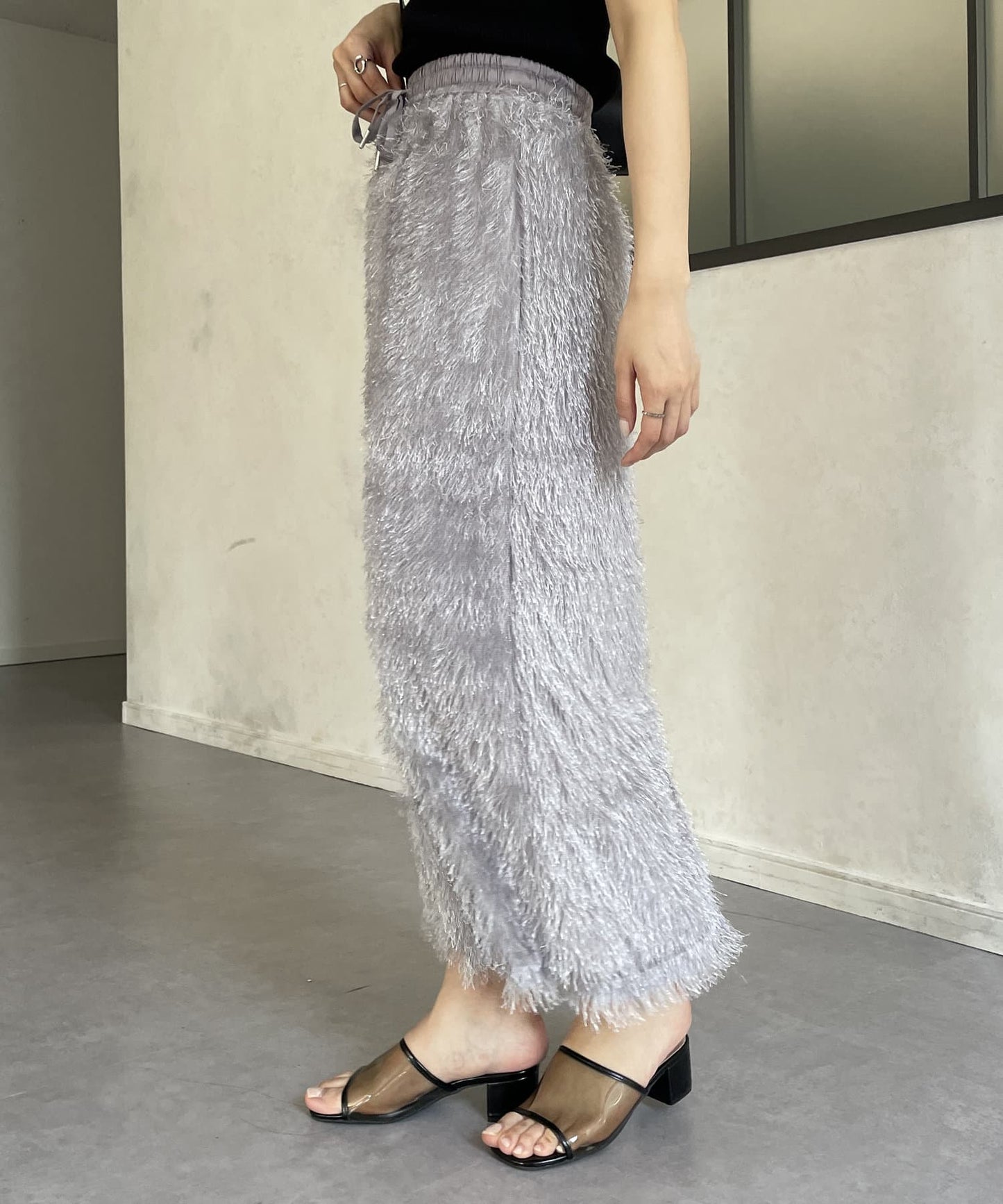 Thevon. Lame Fringe Narrow Skirt  Sparkle Fringe & Sleek Silhouette