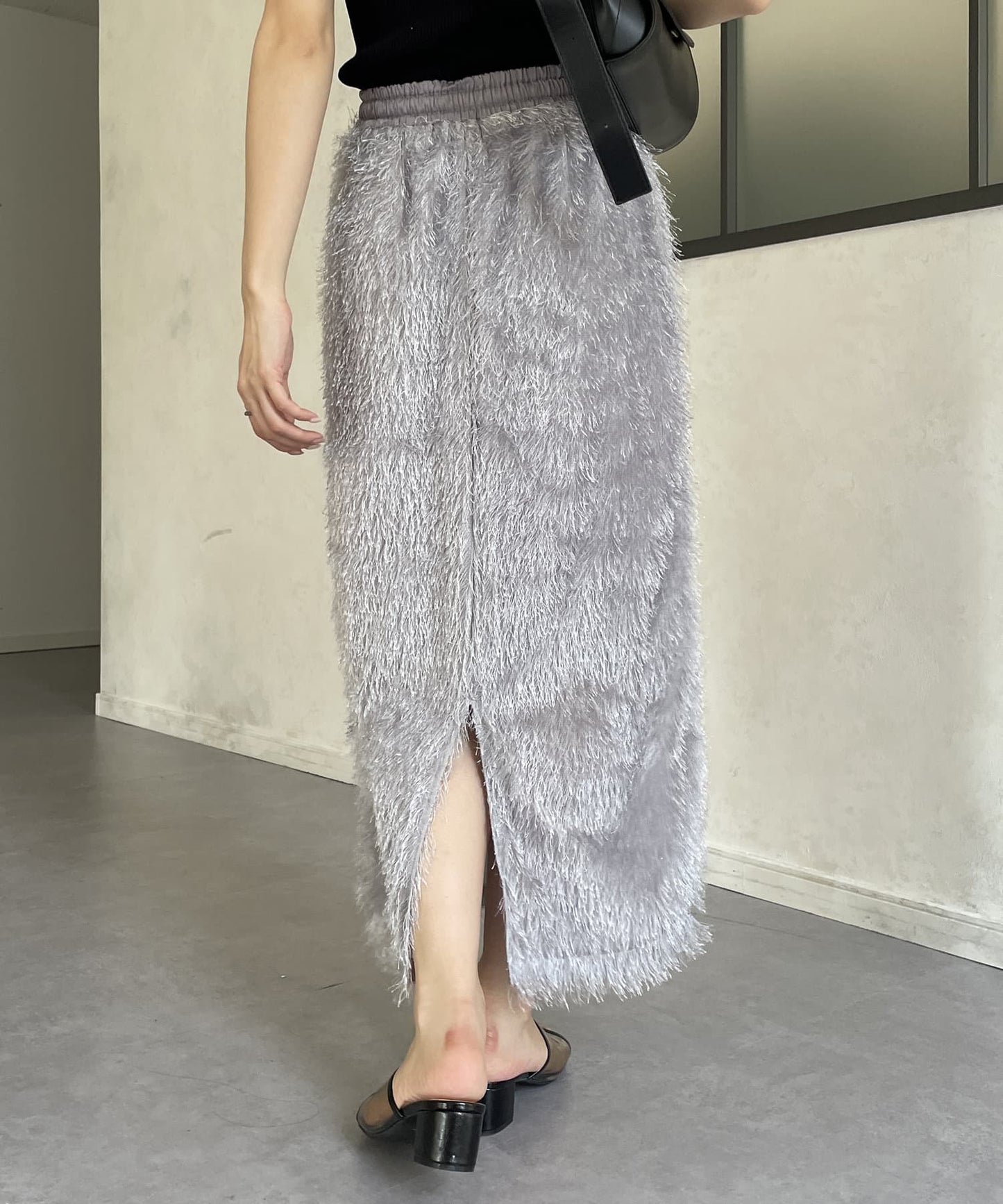 Thevon. Lame Fringe Narrow Skirt  Sparkle Fringe & Sleek Silhouette
